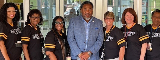 Dr. Horton poses with Oak View&#39;s Original Staff Members