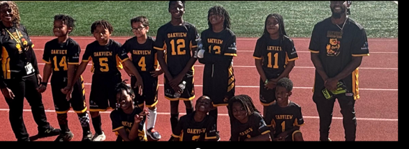 Oak View Soccer Players and Coaches pose for a picture.