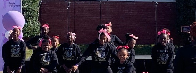 Cheerleaders Cheer at the 5K Tri-Cancerlon