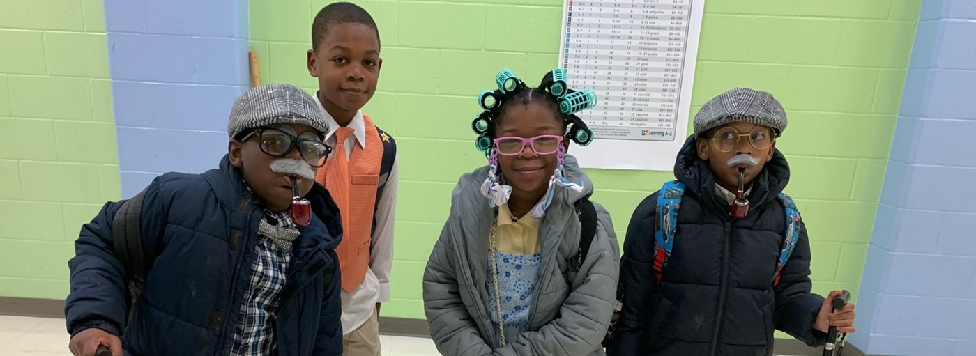 Three students dressed like they are 100 years old